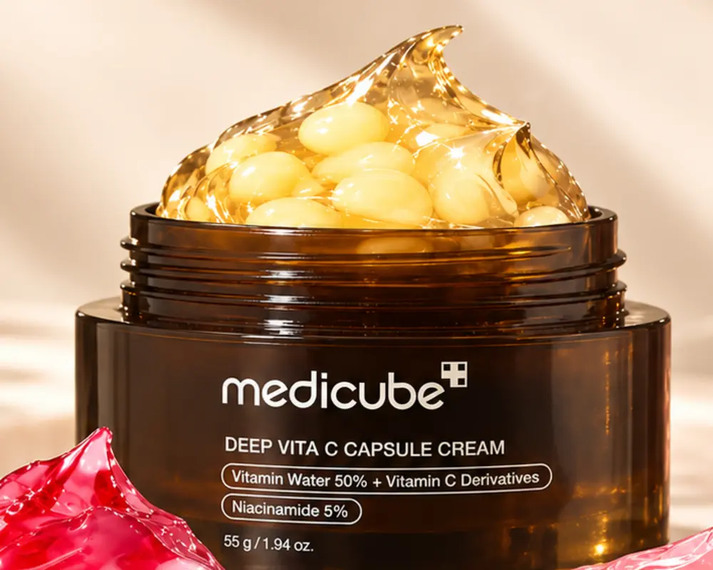 Close-up of the golden Vitamin C capsules