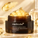 Medicube Deep Vita C Capsule Cream jar with golden capsules